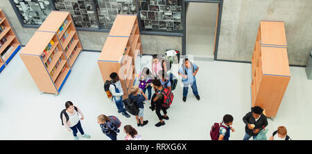 Junior high students in library Stock Photo