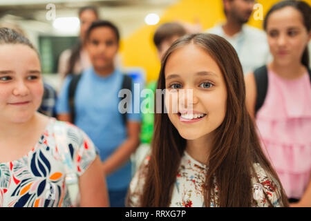 Portrait confident, smiling junior high girl student Stock Photo