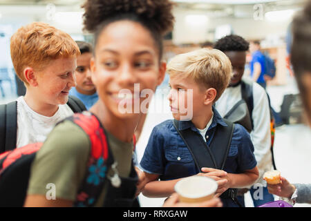 Junior high students hanging out Stock Photo