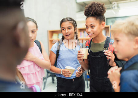 Junior high students talking Stock Photo