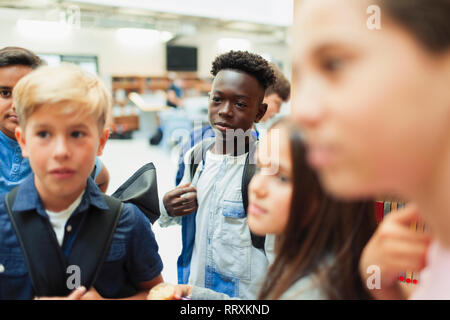 Junior high students in library Stock Photo
