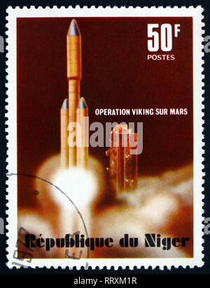 NIGER - CIRCA 1977: a stamp printed in Niger shows Titan Rocket Launch, Viking Mars Project, circa 1977 Stock Photo