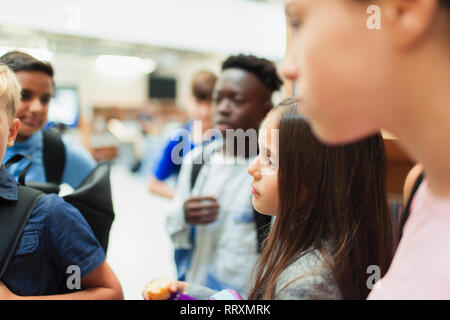 Junior high students talking Stock Photo