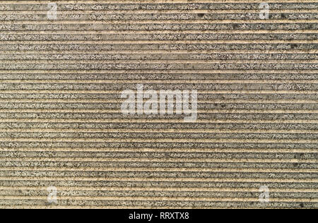 Structured tile of sandstone, front perspective Stock Photo