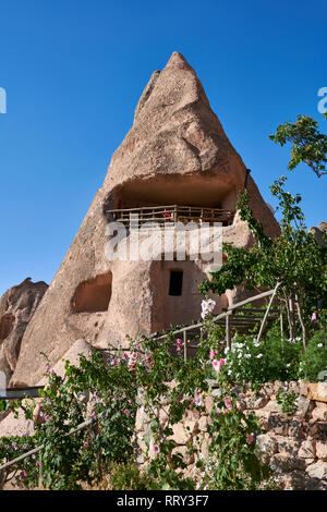 Cafeteria Balkonlu a typical fairy chimney cave house, Uchisar, near Goreme, Cappadocia, Nevsehir, Turkey Stock Photo