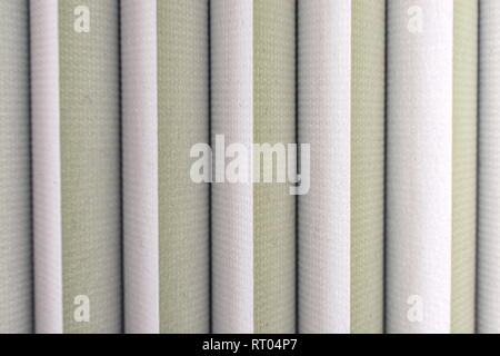 background photo of vertical lines that belong to grey cloth blinds Stock Photo