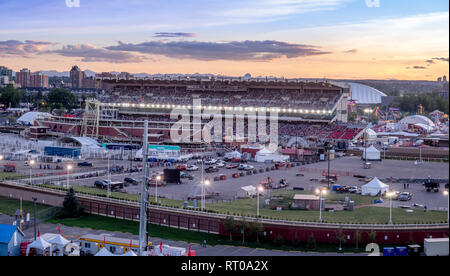 Panoramic view of the the Calgary Stampede at sunset in Calgary, Alberta. The Calgary Stampede is often called the greatest outdoor show on earth. Stock Photo