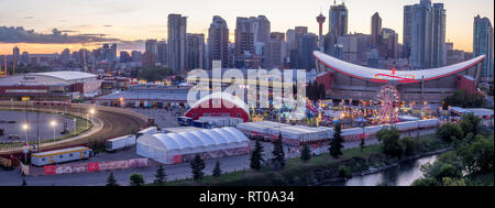 Panoramic view of the the Calgary Stampede at sunset in Calgary, Alberta. The Calgary Stampede is often called the greatest outdoor show on earth. Stock Photo