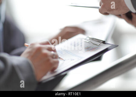 close up. business team analyzing financial schedules Stock Photo