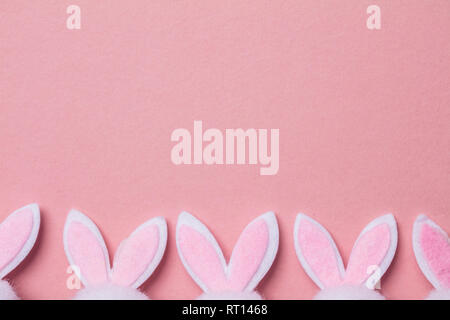Bunny rabbit ears on a pastel pink background Stock Photo