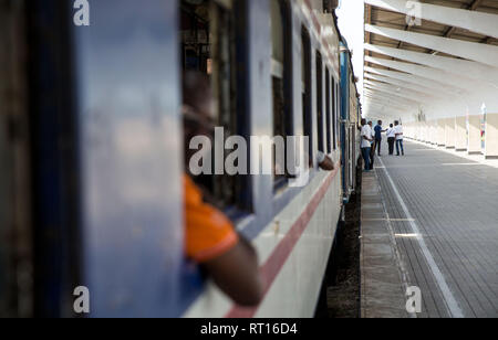 Beijing, Tanzania. 14th Feb, 2019. Passengers get on a train before departure at the Dar Es Salaam station of Tanzania-Zambia Railway in Dar Es Salaam, capital of Tanzania, Feb. 14, 2019. Credit: Lyu Shuai/Xinhua/Alamy Live News Stock Photo