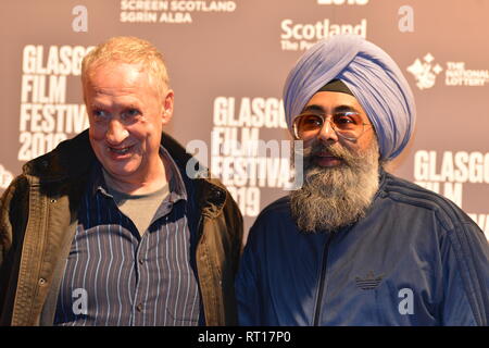 Glasgow, UK. 26th Feb, 2019. (left) Renowned Artist - Peter Howson and (right) Hardeep Singh Kohli, seen on the red carpet at the Premier of the film, Prophecy, at the Glasgow Film Theater. Credit: Colin Fisher/Alamy Live News Stock Photo