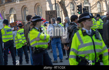 London 27th February 2019 Pro and anti Brexit protesters took part in a number of rallies and short marches at various locations in Westminster Police worked hard to keep the two protests outside Downing Street, London, seperate Credit Ian Davidson/Alamy Live News Stock Photo