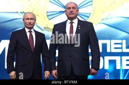 Moscow, Russia. 27th Feb, 2019. Russian President Vladimir Putin stands with Vladimir Kovtun after presenting him the Hero of Russia Star at a gala marking the Day of Russian Special Operations Forces February 27, 2019 in Moscow, Russia. Kovtun was awarded the medal for his part in a special operation in Afghanistan. Credit: Planetpix/Alamy Live News Stock Photo