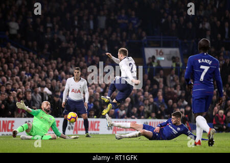 London, UK. 27th Feb, 2019. Christian Eriksen of Tottenham Hotspur's (1R) has a shot on goal saved by Willy Caballero, the goalkeeper of Chelsea (1L). Premier League match, Chelsea v Tottenham Hotspur at Stamford Bridge in London on Wednesday 27th February 2019. this image may only be used for Editorial purposes. Editorial use only, license required for commercial use. No use in betting, games or a single club/league/player publications. pic by Steffan Bowen/ Credit: Andrew Orchard sports photography/Alamy Live News Stock Photo