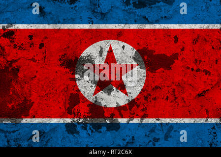 North Korea flag on old wall. Patriotic grunge background. National flag of North Korea Stock Photo