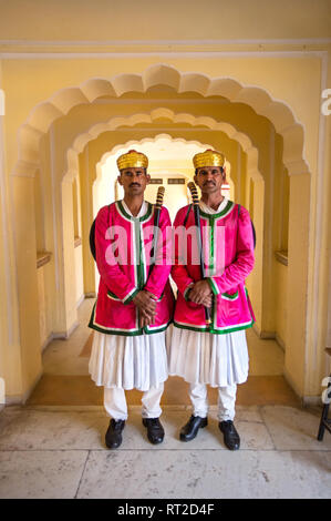 security gurads in old traditional rajasthani costumes at city palace,jaipur,rajasthan,north india,rajasthan tourism,indian tradition,asia Stock Photo