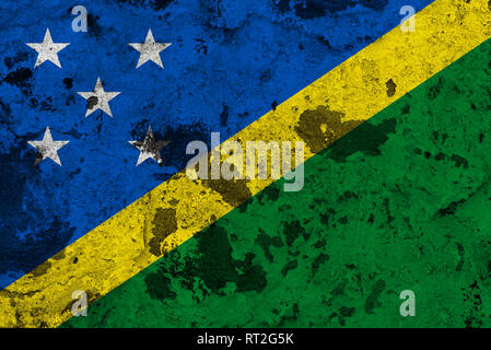 Solomon Islands flag on old wall. Patriotic grunge background. National flag of Solomon Islands Stock Photo