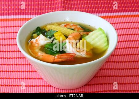 Thai Spicy Mixed Vegetable Soup with Prawns (Gang Liang Goong ) Stock Photo