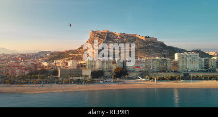 Aerial photography drone view Alicante cityscape above panorama main landmark in city center Santa Barbara castle on the Mount Benacantil Spain Stock Photo