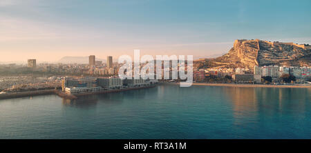 Aerial photography drone view Alicante cityscape above panorama main landmark in city center Santa Barbara castle on the Mount Benacantil Spain Stock Photo