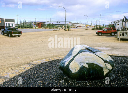 Beluga Whale painting on a rock in the center of the town of Churchill, Canada
