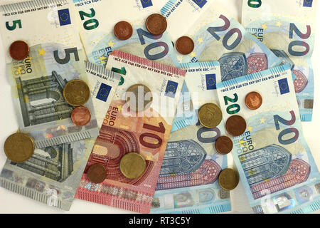 Close up of Euro Banknotes and Coins Stock Photo