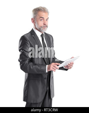 modern businessman reading text on a digital tablet.isolated on grey background Stock Photo