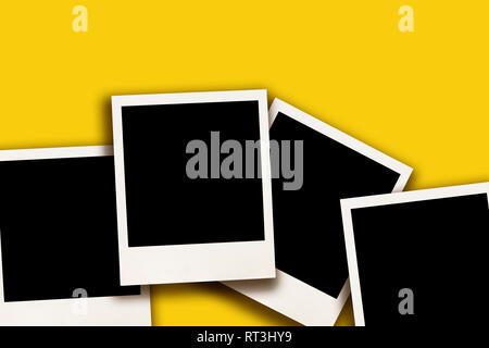 Blank vintage images on yellow background Stock Photo