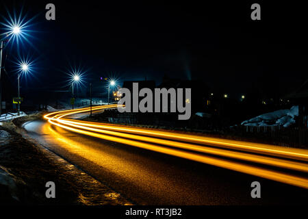 Magnificent shake the light of car lights in the evening on the highway with the stars of streetlights 2019 Stock Photo