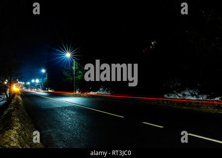 Magnificent shake the light of car lights in the evening on the highway with the stars of streetlights 2019 Stock Photo
