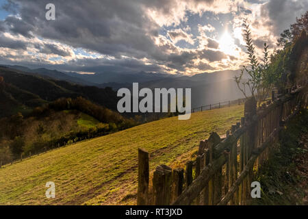 Spain, Asturias, Mountain landscape against the sun Stock Photo