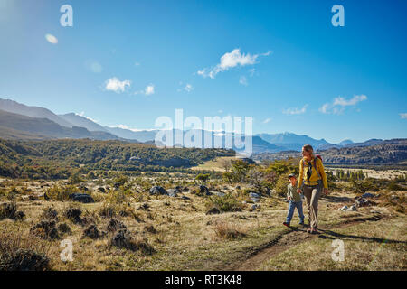 Chile, Cerro Castillo, mother with son on a hiking trip
