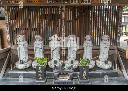 Taito Ward, Tokyo, Japan - August 18, 2017: Hatsune Roku Jizo statues at Kanchiin Temple, founded in 1611 by priest Shoyo Ryogaku devoted to Dainichi  Stock Photo