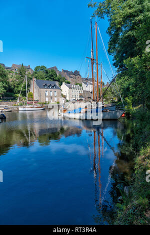 At La Roche-Bernard, Morbihan, Brittany, France is a harbour. There are sailing and motorboats in La Roche-Bernard harbor & cottages on the quay side. Stock Photo