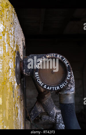 Close up of a vintage petrol pump glass measure Stock Photo