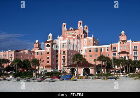 Appropriately called the Pink Palace, The Don Cesar is a splendid beach resort and spa that sprawls along a sandy shore of the Gulf of Mexico at St. Pete Beach on the west coast of  Florida, USA. Celebrities and other members of high society flocked to the landmark lodging in the Tampa Bay area when it opened in 1928 during the Sunshine State's early boom years. Beginning in 1942 the grand hotel was used as a hospital and convalescent center for wounded World War II soldiers before falling into disrepair. New owners in 1973 restored the towered nine-story hoitel to its former glory. Stock Photo