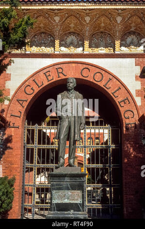 A bronze statue of American industrialist Henry M. Flagler (1830-1913) stands in front of his namesake Flagler College in St. Augustine, Florida, USA. Founded in 1968 in the heart of that city, the liberal arts school boasts an architectural attraction, the historic Ponce De Leon Hotel, which was built by Flager in 1885 as one of the first luxurious resorts along Florida's Atlantic Coast. After becoming wealthy as a founder of Standard Oil, he became known for developing early tourism in the Sunshine State by building more grand hotels and the Florida East Coast Railway. Stock Photo