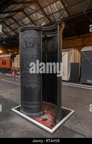 A single person male cast iron urinal from Curthwaite rail station in Cumberland. National Railway Museum, York, UK. Stock Photo