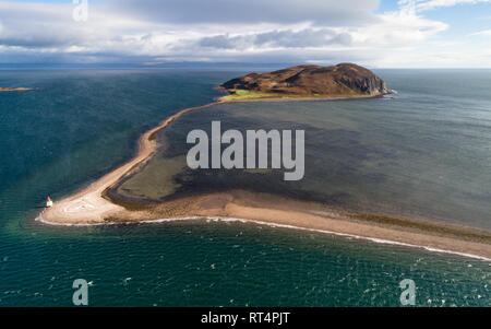 Aerial image showing Davaar Island and The Doirlinn, a shingle penisula which joins it to the mainland, in dramatic light. Stock Photo