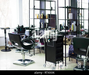 Brand new interior of european beauty salon. Work place of hair stylist Stock Photo