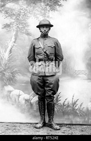 Harry S. Truman standing in front of a standard postcard backdrop during the first World War. Stock Photo