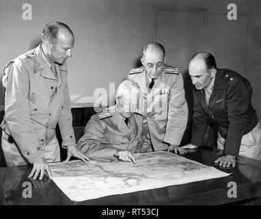 World War II photograph of Admiral Chester W. Nimitz during a strategy session. Stock Photo