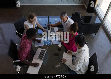 Business colleagues working together in office Stock Photo