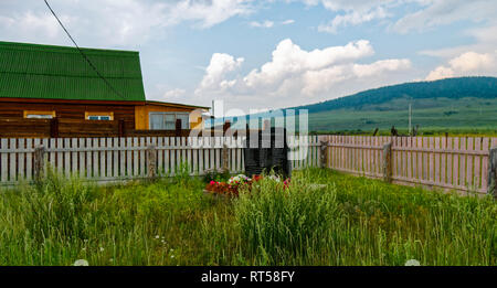 A sample of wooden architecture in the Baikal village. Wood construction. Stock Photo