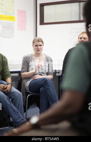 Adult Learning Sign Language For Deaf Disabled Stock Photo - Alamy