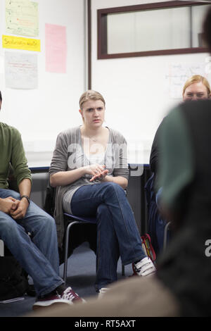 adults in a further education college learning how to use sign language Stock Photo