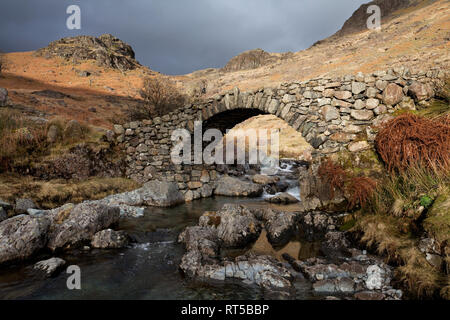 Lingcove Bridge over Lingcove Beck in Upper Eskdale, in the English Lake District Stock Photo