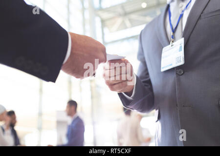 Close-up of business people exchanging business card Stock Photo