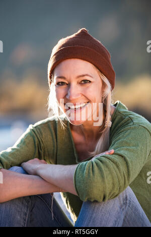 Portrait of a mature woman smiling Stock Photo - Alamy